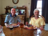 Mom and Dad laughing at lunch