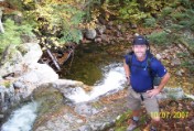 Bruce peers down into cascade on Whiteface Brook