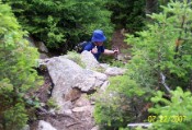 Nate assaulting narrow vertical section of Willey Range Trail