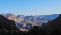 Early sun hits the canyon in the distance