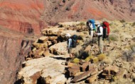 A cautious approach to the 900 foot cliffs into Hance Creek Canyon