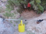 Sediment buckets - orange one hangs in tree