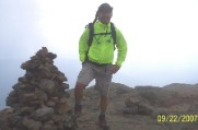 Bruce in the clouds on the summit of Mt Lincoln