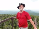 Breezy on top of old fire tower frame on Snow