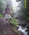 Nate in the mist by the brook