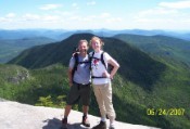 Bruce and Em, Mt Osceola summit, northeast view behind