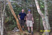 The boys at the wooded summit and cairn of the vaunted Owls Head