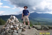 Nate at Mt Jackson summit early, Southern Peaks in background