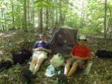 Resting after establishing camp Saturday at the base of Dorset