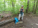 Monadnock Hike - R warming up in the cool dank