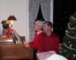 Mother and Son sing carols on Christmas Eve