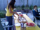 Natalie cutting her cake