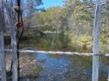 Up river through the broken slats