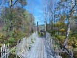 We find a cool suspended snowmobile bridge in VT