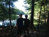 Mike and John near a scenic pond