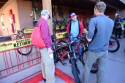 Getting the low down on our rentals at Poison Spider Bicycles